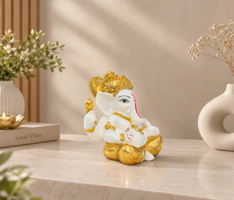 White and Gold-Tone Seated Ganesha Figurine