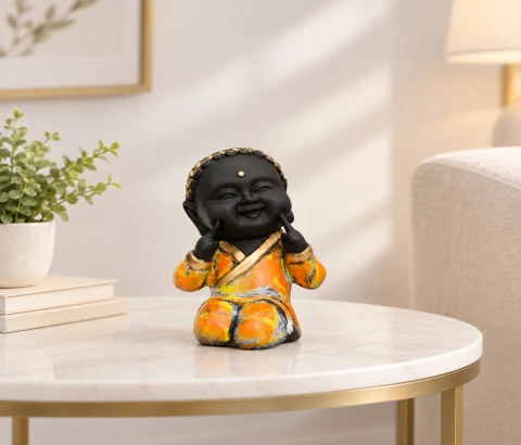 Smiling Little Monk with Cheek Gesture