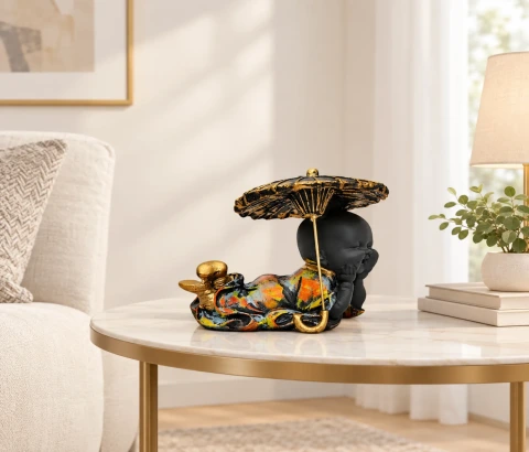 Resting Baby Buddha with Gold-Tone Umbrella